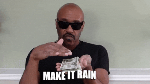 Personne lançant des billets en l'air (make it rain)